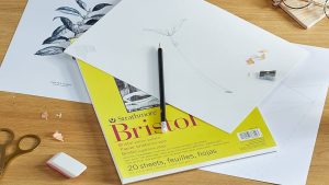 Bir yüzeyi işlenmiş, parlak ve tam beyaz; diğer yüzeyi mat ve pürüzlü olan kaliteli kağıda ne denir?