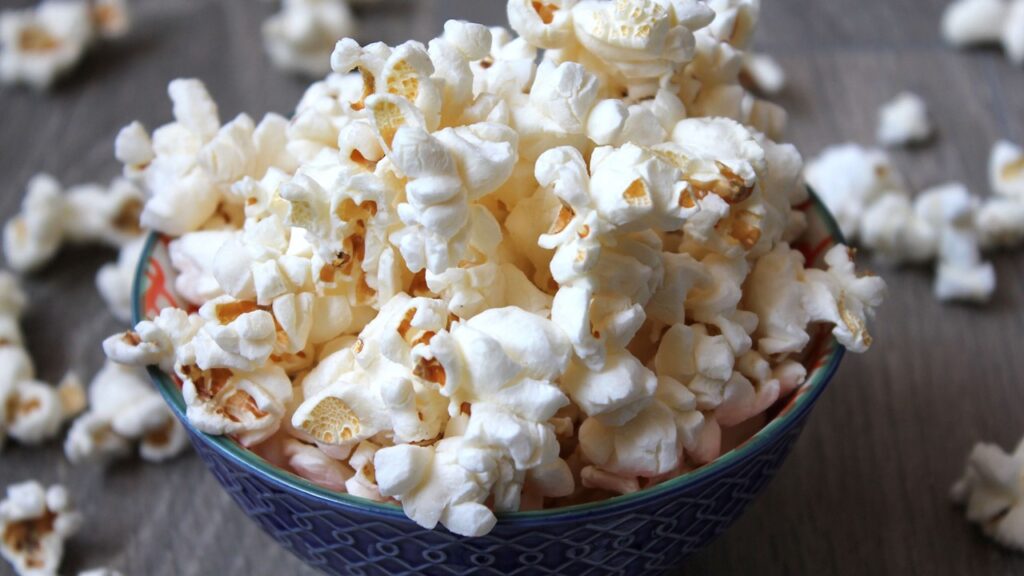 I always eat _____ while watching a movie.