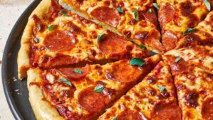 Etwas, das man auf einer Pizza finden kann